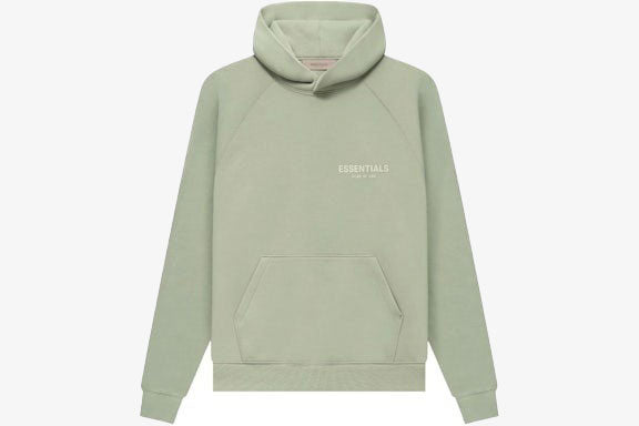 Essentials Core Collection Pullover Hoodie in soft green color, featuring a relaxed fit and fleece interior for comfort.