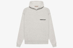 Essentials Core Collection Pullover Hoodie in light gray with a relaxed fit and a soft fleece interior.