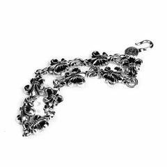 BS Fleur Cross Cut Out Link Bracelet