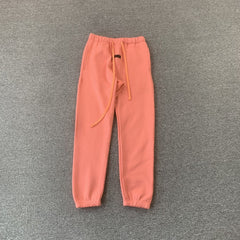 Fear Of God Essentials Pants Coral