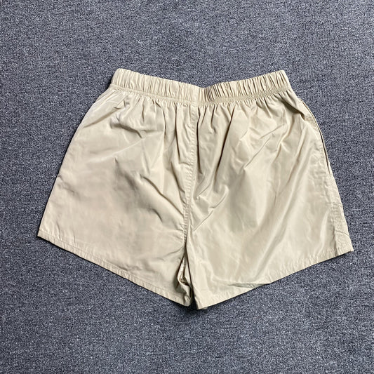 Fear of God Essentials Running Nylon Short Egg Shell
