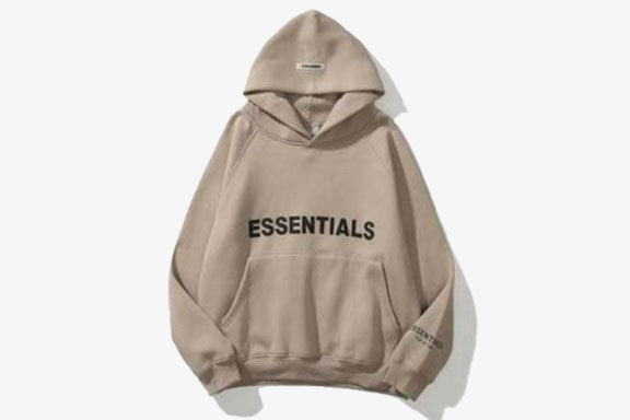 ESSENTIALS Oversized Hoodie in neutral beige with spacious hood and relaxed fit for ultimate comfort and style.
