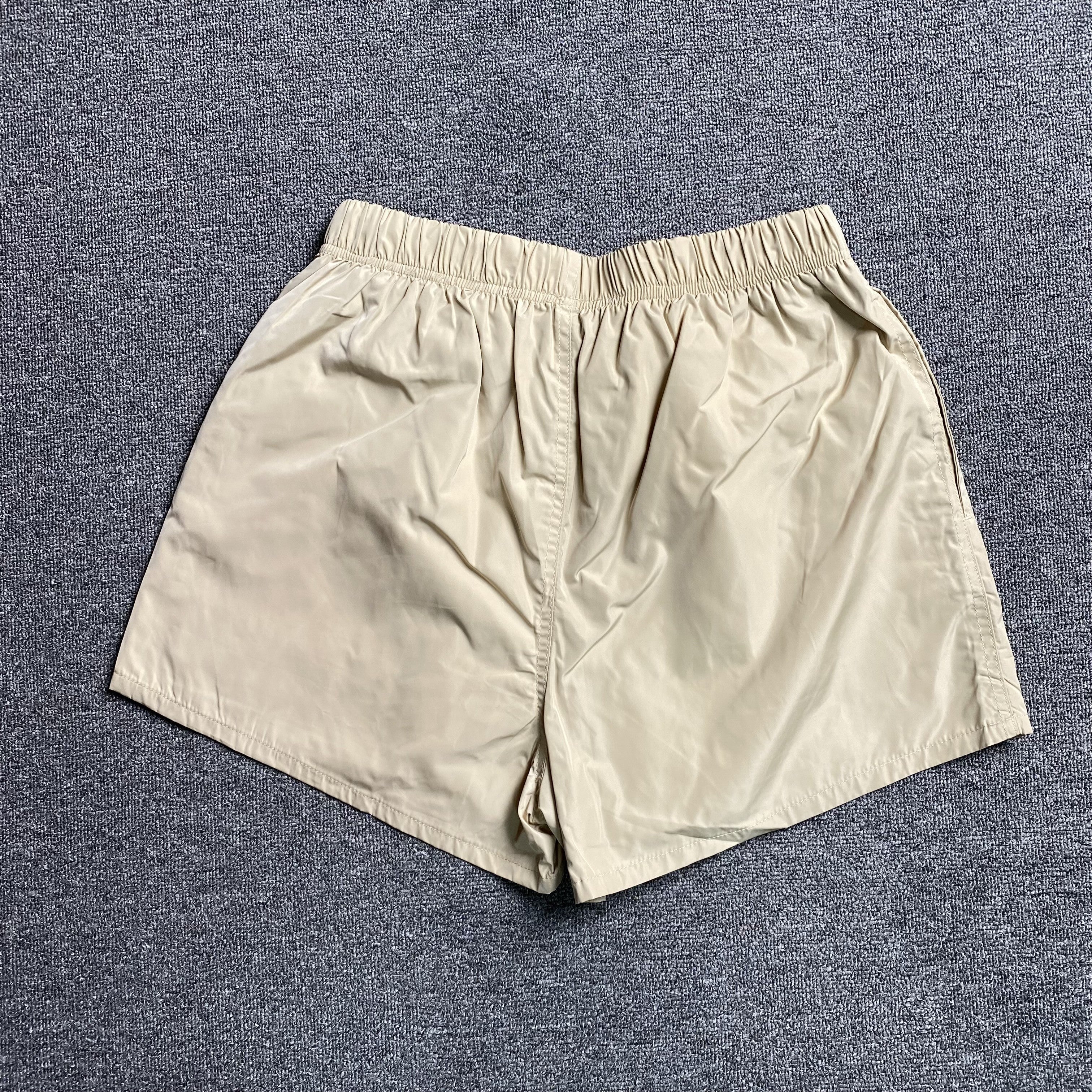 Fear of God Essentials Running Nylon Short Egg Shell