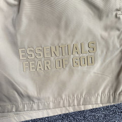Fear of God Essentials Running Nylon Short Egg Shell