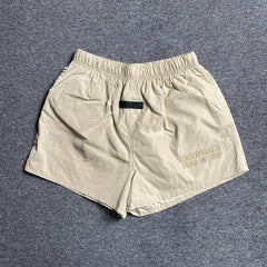 Fear of God Essentials Running Nylon Short Egg Shell