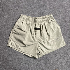 Fear of God Essentials Running Nylon Short Smoke