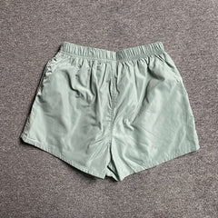 Fear of God Essentials Running Nylon Short Sycamore