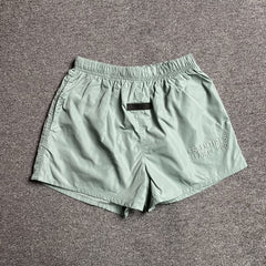 Fear of God Essentials Running Nylon Short Sycamore